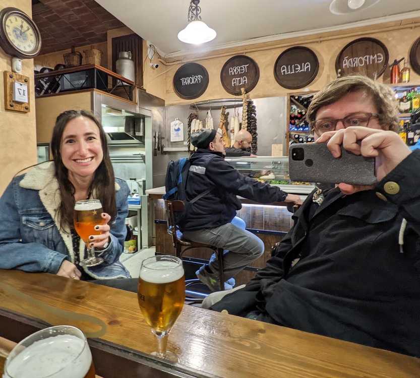 madi and logan at a bar